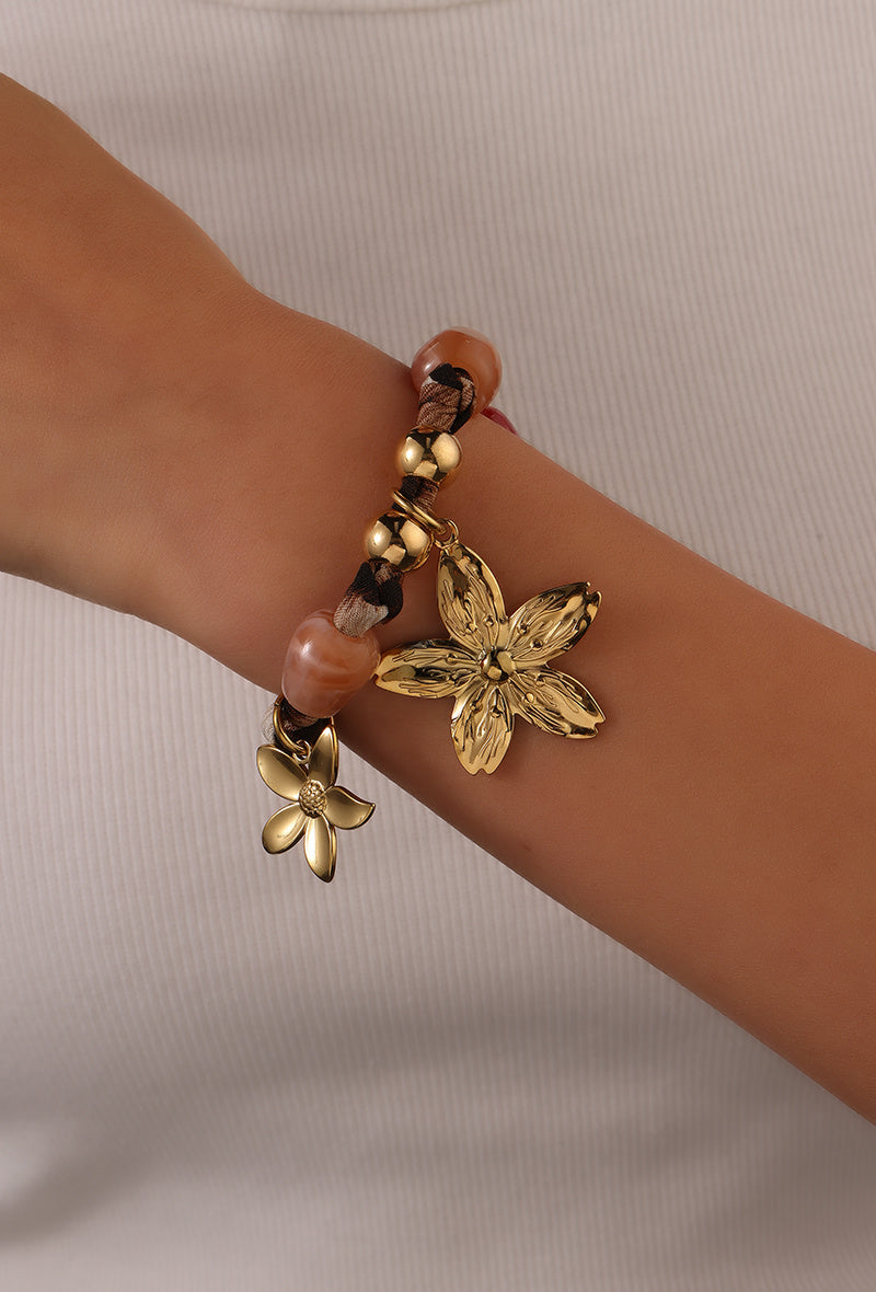 🌸 Bracelet léopard à breloques – Audace & féminité 🌸