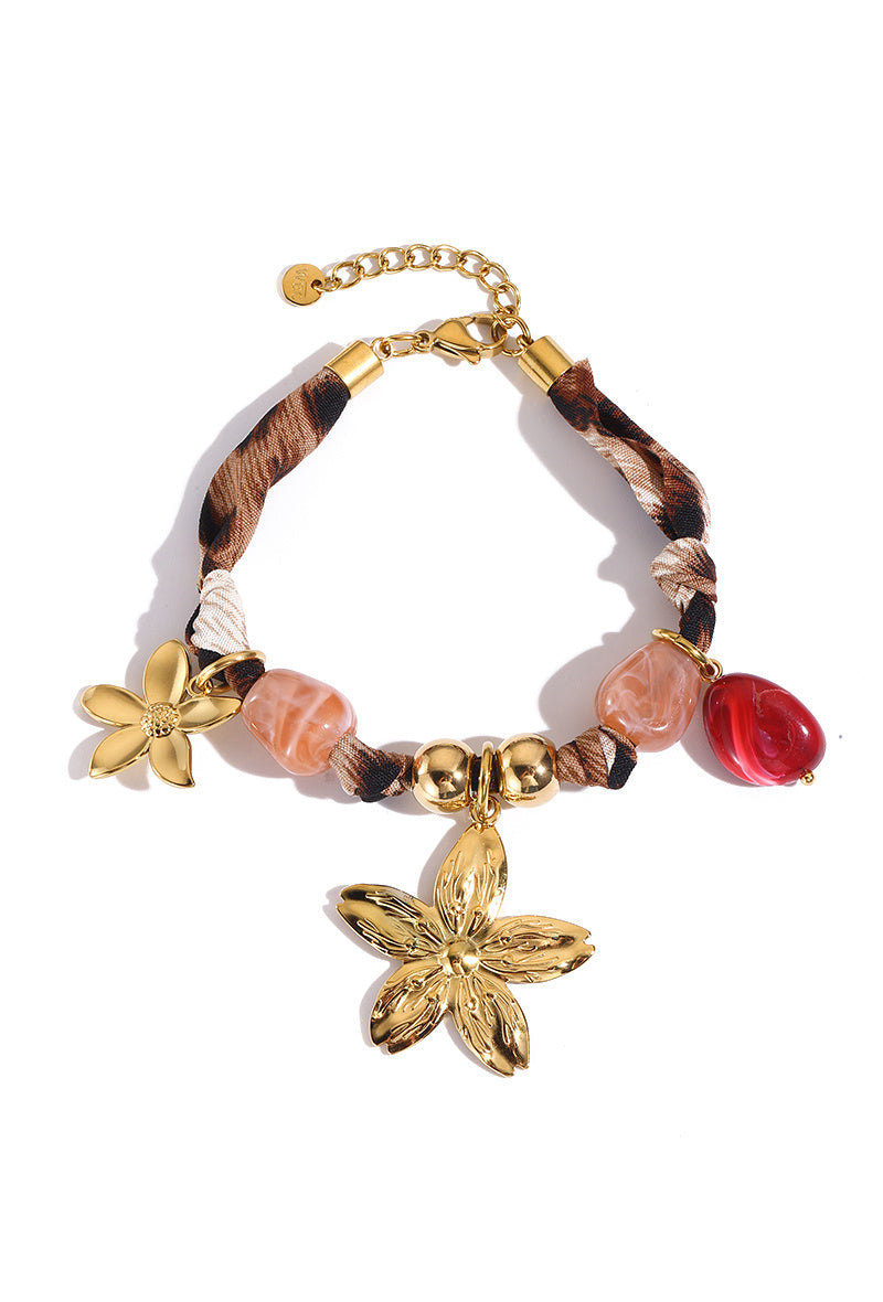 🌸 Bracelet léopard à breloques – Audace & féminité 🌸